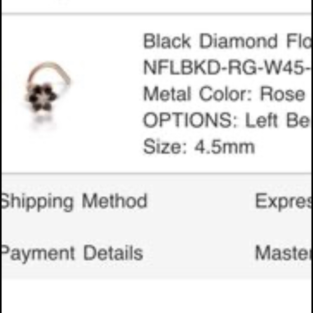 Maria  tash left nostril nose ring black diamond and gold